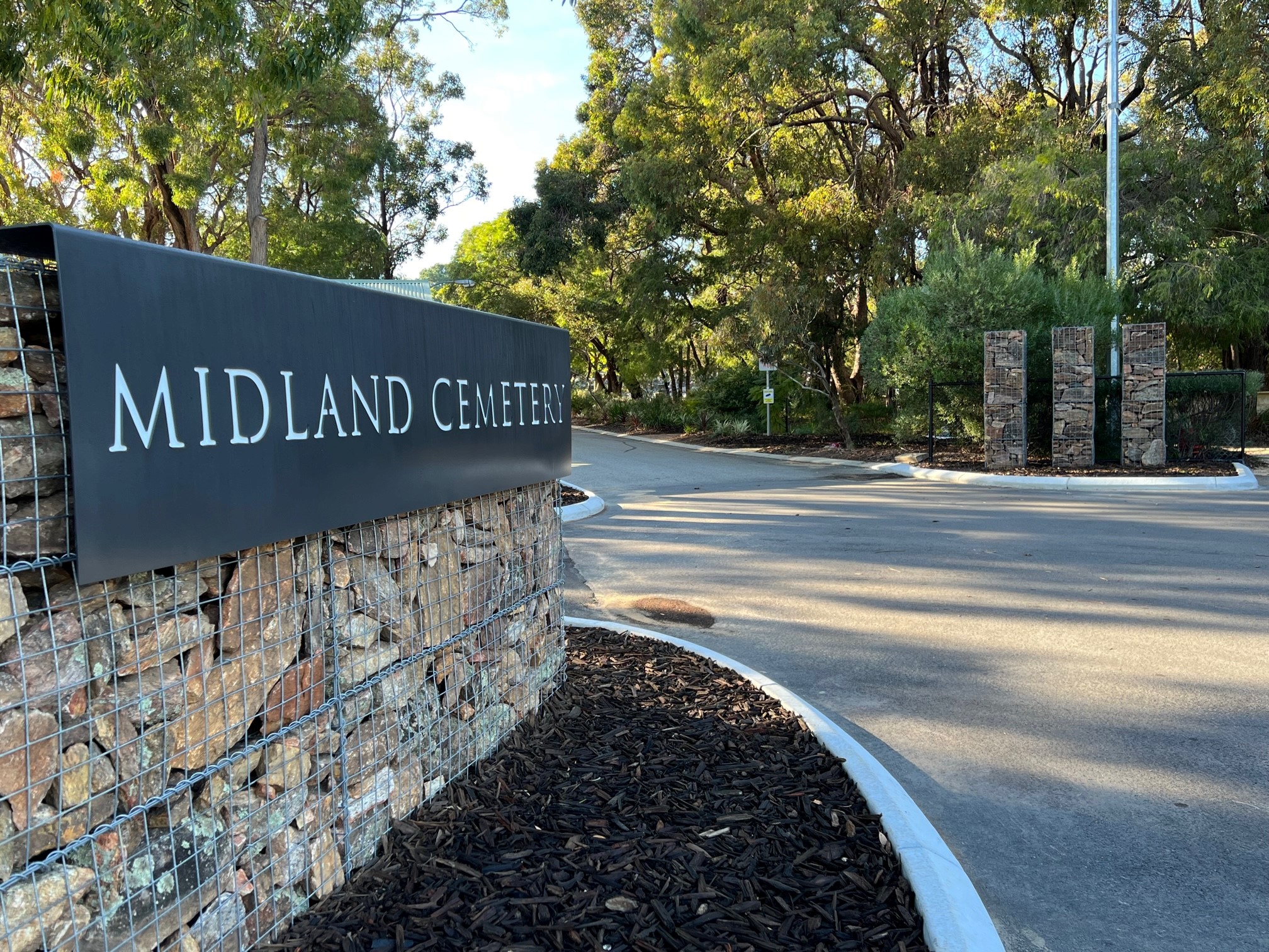Midland Cemetery sign and gabion wall and pillars